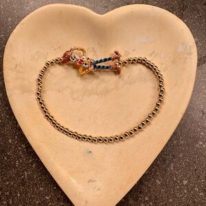 Gold Beaded Bracelet with Colorful Woody Charm